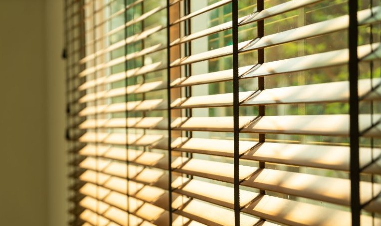 Faux Wood vs. Real Wood Blinds: Style, Cost, and Durability